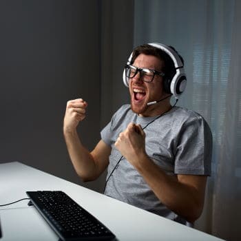 Man playing video games with gaming headset