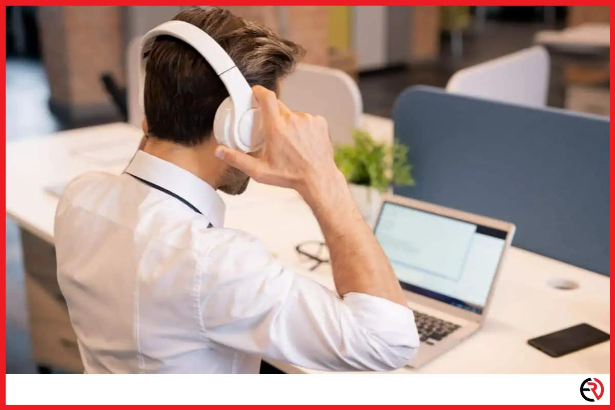 Man wearing headphones at the office
