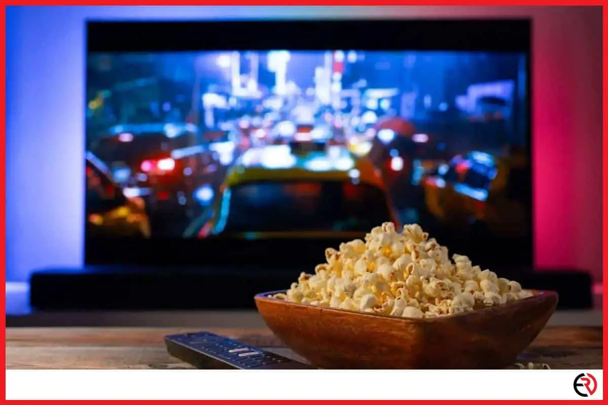 TV with popcorn at the table