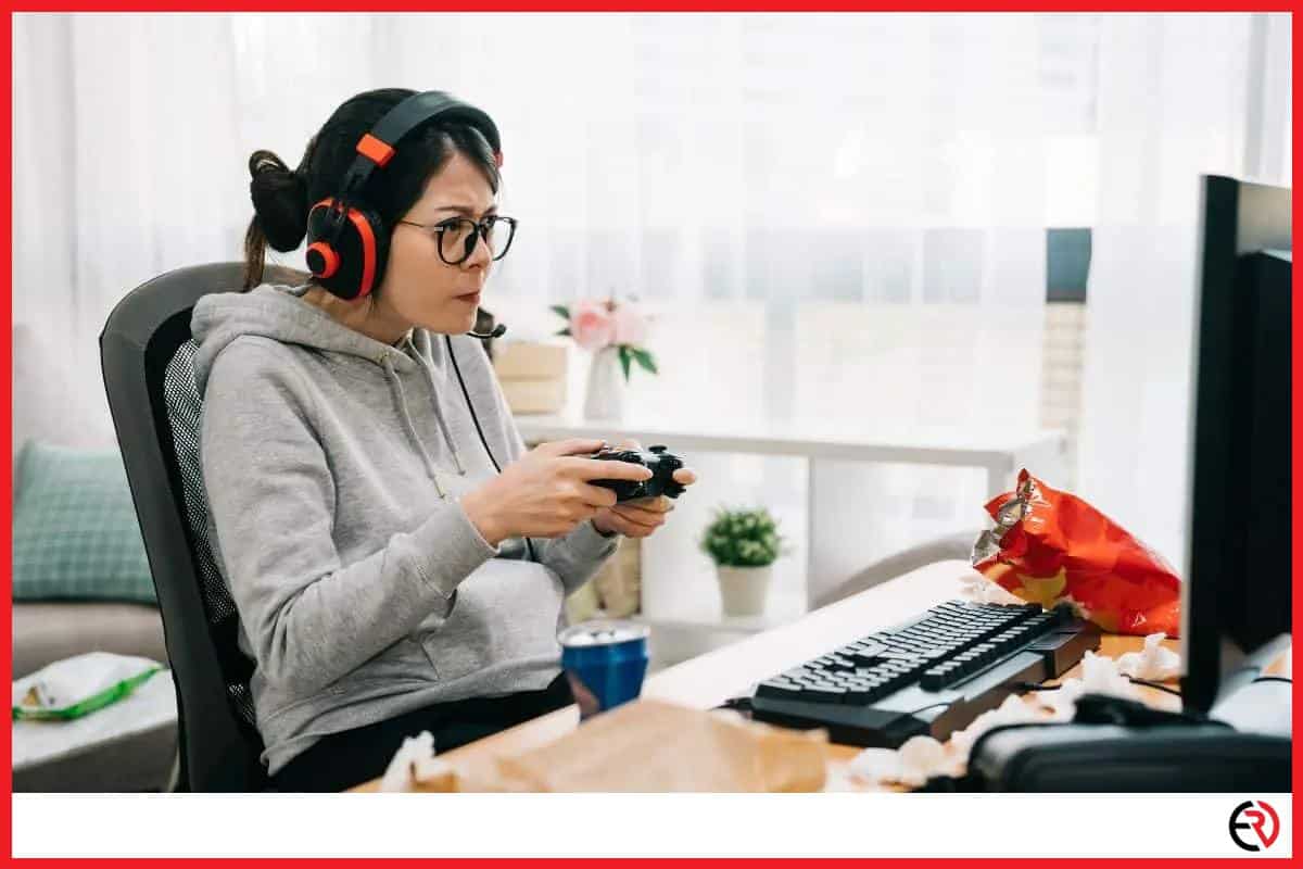 Girl with glasses is gaming