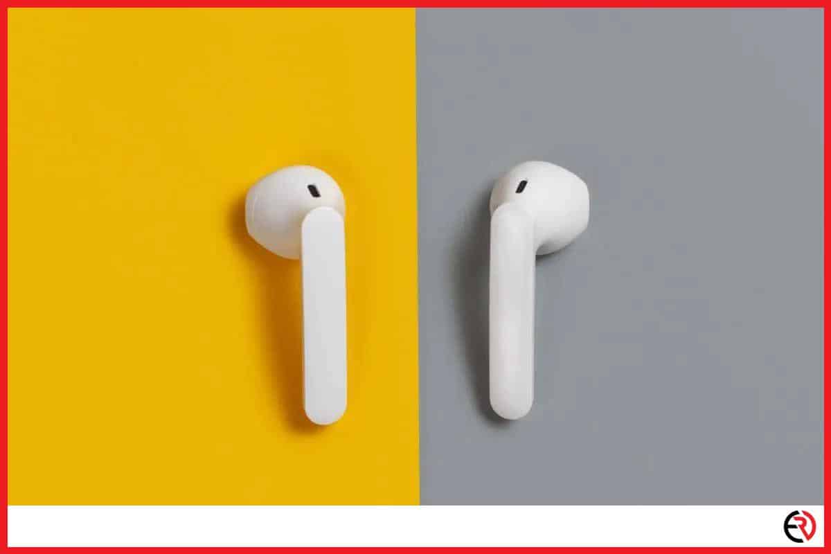 A pair of AirPods on yellow and gray background