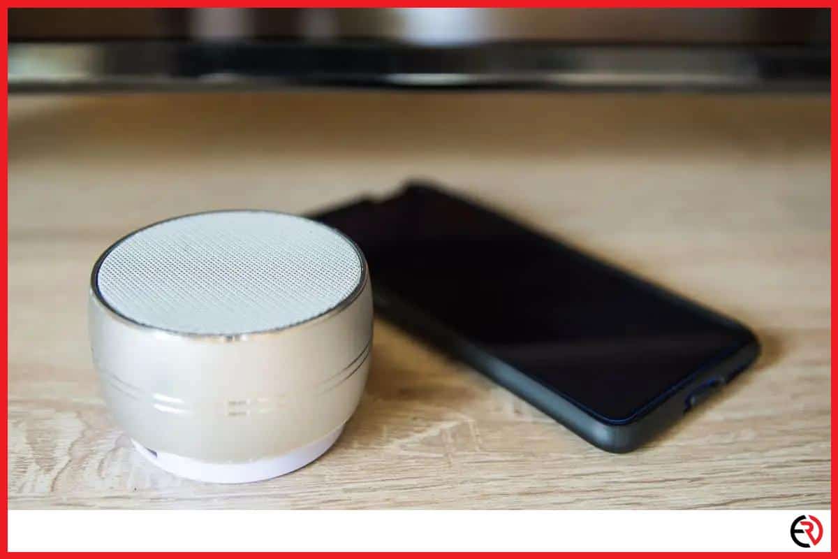 Bluetooth speaker next to a smart phone