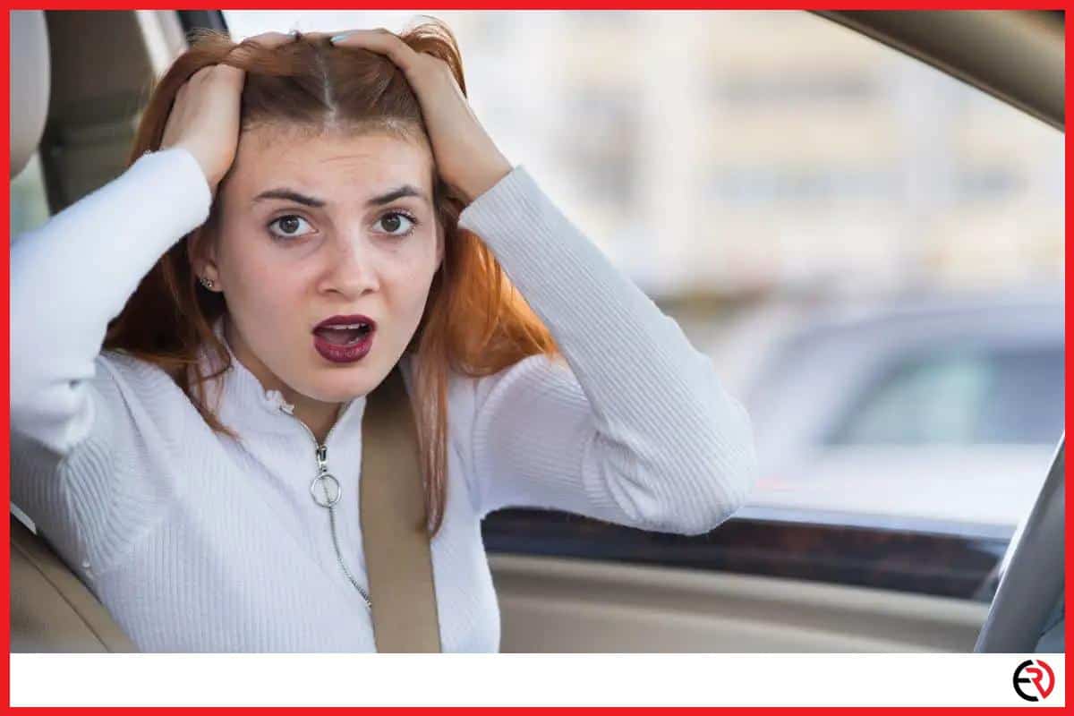Woman annoyed in car because Bluetooth audio keep disconnecting